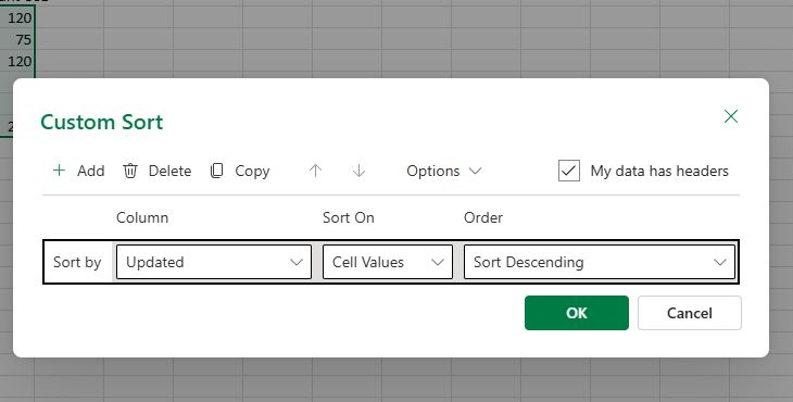 Actual English Excel for the web Custom Sort dialog set to Updated, Cell Values, Sort Descending.